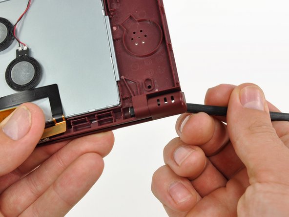 Nintendo DSi XL Front Bezel Replacement: step 38, image 2 of 3