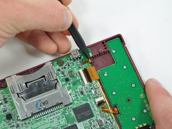 Nintendo DSi XL Front Bezel Replacement: step 13, image 2 of 2