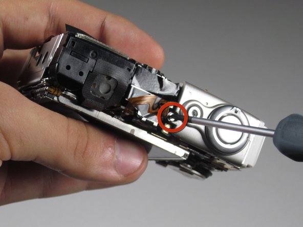 Canon Powershot SD550 Shutter Button Replacement: step 7, image 1 of 2