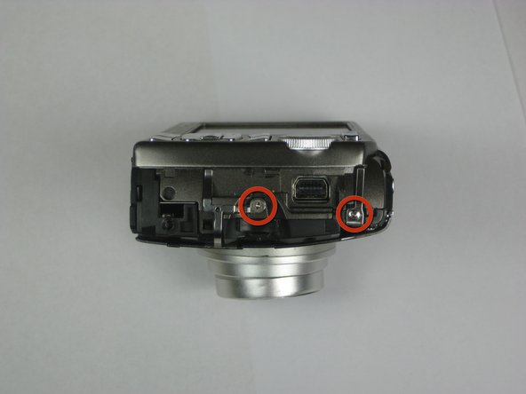 Disassembling Olympus Stylus 1010 Case: step 3, image 1 of 2