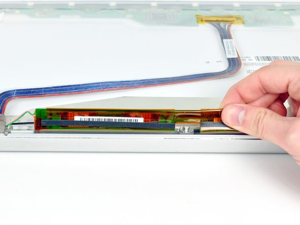 PowerBook G4 Aluminum 17" 1.67 GHz (High-Res) Front Display Bezel Replacement: step 44, image 2 of 2