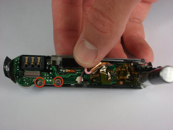 Panasonic Lumix DMC-FX01 On/ Off and Settings Button cover replacement: step 13, image 1 of 1