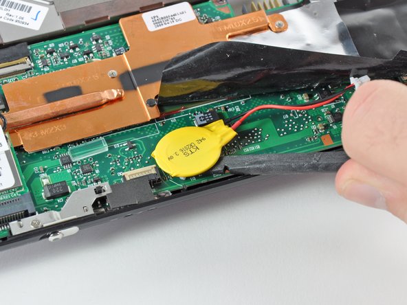 HP Mini 1000 PRAM Battery Replacement: step 19, image 2 of 2