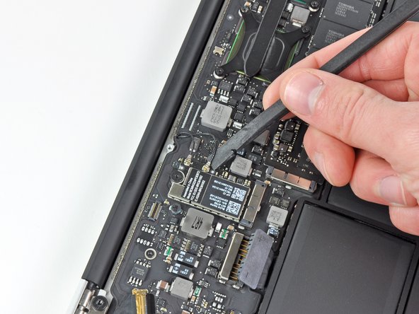 MacBook Air 11" Late 2010 AirPort/Bluetooth Card Replacement: step 4, image 1 of 2