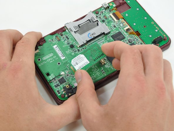 Nintendo DSi XL Hinges Replacement: step 3, image 2 of 2