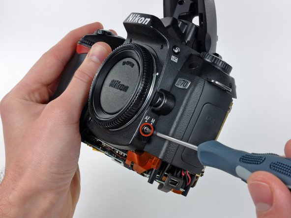 Nikon D70 Strap Loops Replacement: step 14, image 1 of 2