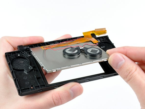 Nintendo DSi Upper LCD/Speakers Replacement: step 31, image 2 of 2