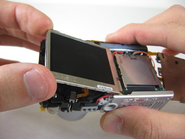 Disassembling Pentax Optio S4i Lens Assembly: step 16, image 1 of 1