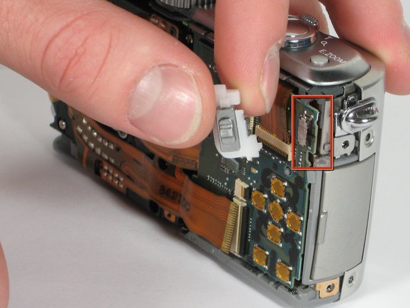 Panasonic Lumix DMC-TZ5 Button Board Replacement: step 8, image 2 of 2