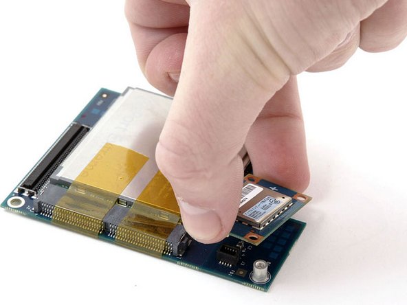 Mac mini (PowerPC) Bluetooth Board Replacement: step 13, image 1 of 1