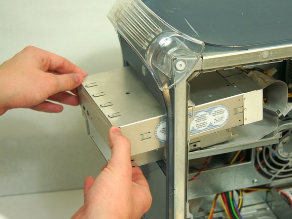 Removing PowerMac G4 M5183 DVD-ROM Drive Tray: step 4, image 1 of 3