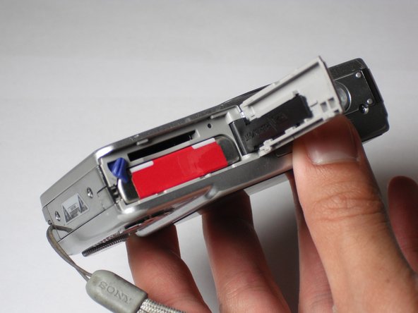 Sony Cyber-shot DSC-W55 Front Case Replacement, Sony Cyber-shot DSC-W55 Front Case Replacement: step 1, image 2 of 2