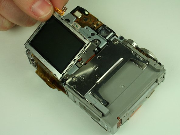 Canon PowerShot S400 Battery Replacement: step 9, image 1 of 2