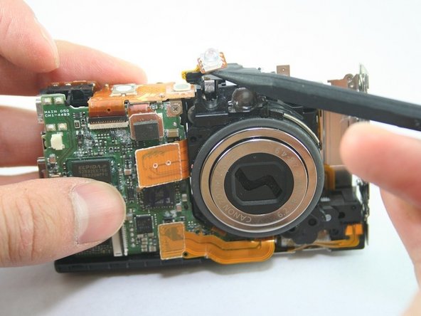 Disassembling Canon PowerShot SD1100 IS AV port and Logic board: step 18, image 2 of 2