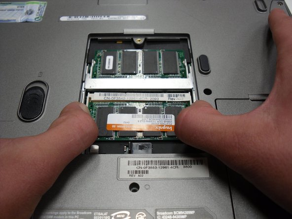 Removing Dell Inspiron 1150 RAM: step 3, image 2 of 3
