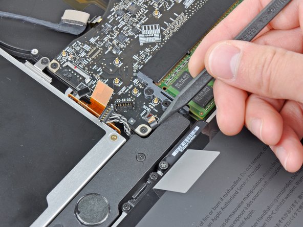 MacBook Pro 17" Unibody Upper Case Replacement: step 14, image 2 of 2