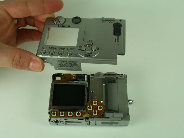 Canon PowerShot S400 Shutter Button Assembly Replacement: step 3, image 1 of 3