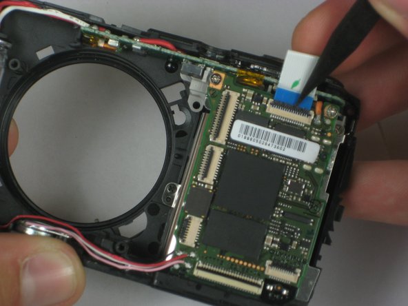 Disassembling Olympus Stylus 1010 Logic Board: step 12, image 1 of 1