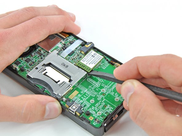 Nintendo 3DS ABXY Buttons Replacement: step 13, image 1 of 2