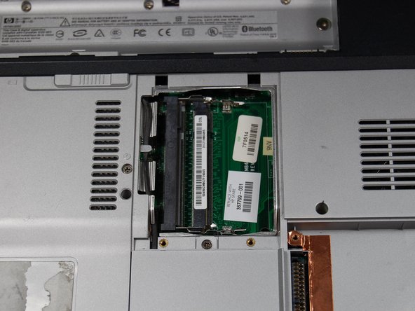 HP Pavilion dv1000 Back Cover Replacement: step 13, image 1 of 1