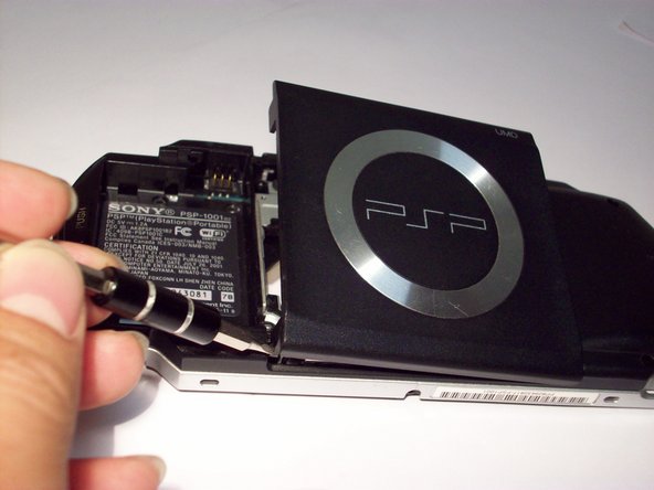 PSP 1000 UMD Door Replacement: step 13, image 1 of 1