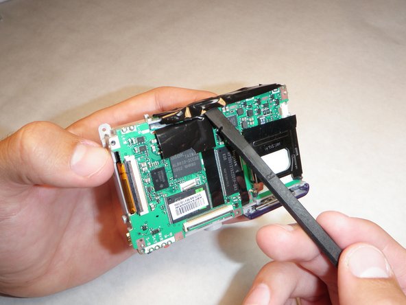 Sanyo VPC S1275 Logic Board Replacement: step 11, image 1 of 2