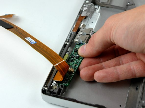 PowerBook G4 Aluminum 17" 1.67 GHz (High-Res) Lower Case Replacement: step 65, image 1 of 2