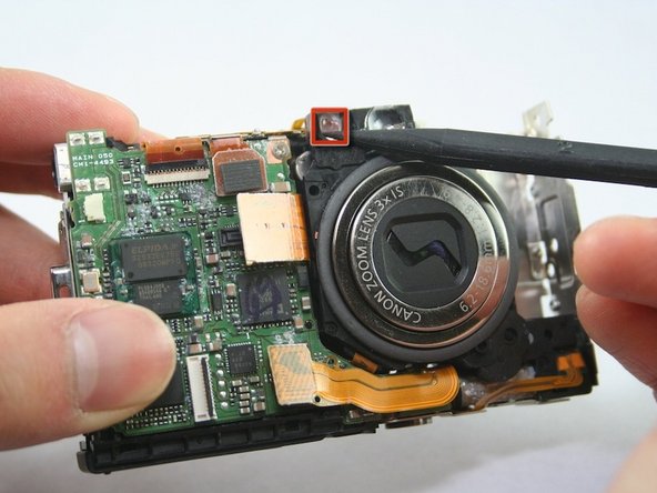 Disassembling Canon PowerShot SD1100 IS AV port and Logic board: step 18, image 1 of 2