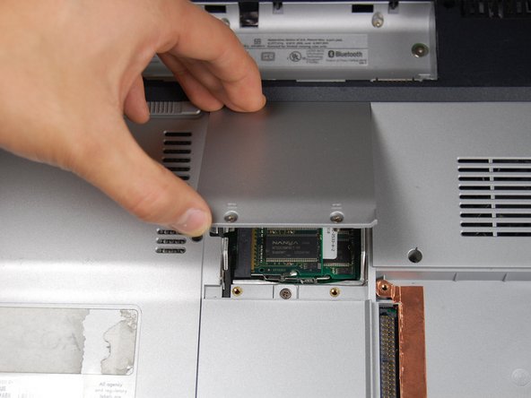 HP Pavilion dv1000 Back Cover Replacement: step 9, image 3 of 3