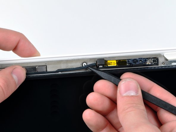 MacBook Unibody Model A1342 iSight Camera Board Replacement: step 6, image 1 of 2