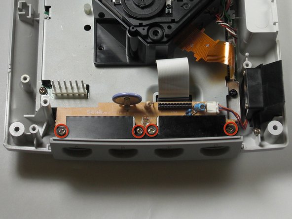 Sega Dreamcast Logic Board Removal: step 10, image 1 of 2
