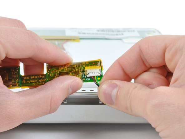 PowerBook G4 Aluminum 15" 1.67 GHz Display Data Cable Replacement: step 28, image 1 of 2