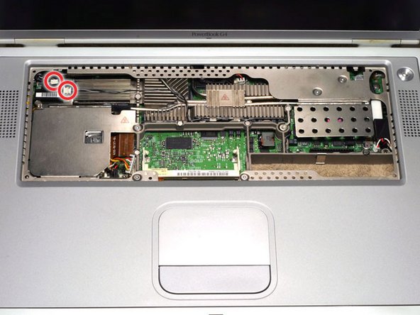 PowerBook G4 Titanium DVI PC Card Cage Replacement: step 23, image 1 of 1