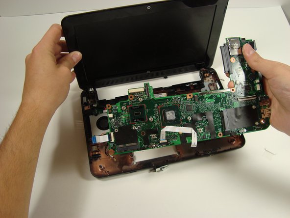 Disassembling Compaq Mini 110 System Board, Disassembling Compaq Mini 110 System Board: step 1, image 2 of 2