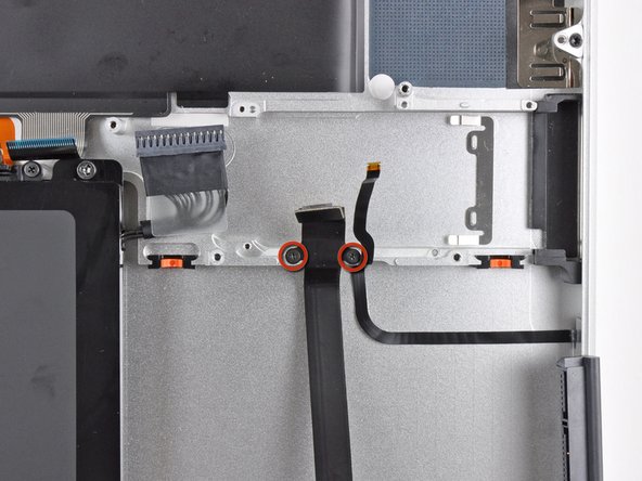 MacBook Pro 17" Unibody Upper Case Replacement: step 30, image 1 of 2