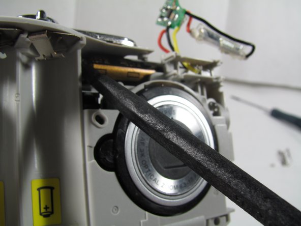 Removing Olympus FE-210 Flash Assembly: step 11, image 1 of 3