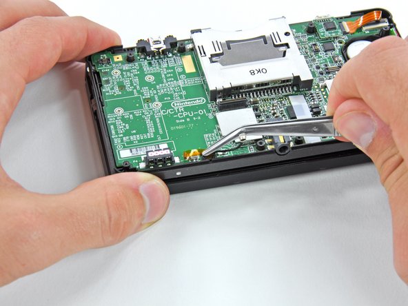 Nintendo 3DS D-pad Replacement: step 15, image 1 of 2