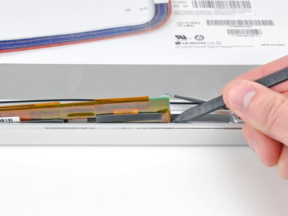 PowerBook G4 Aluminum 17" 1.67 GHz (High-Res) Front Display Bezel Replacement: step 44, image 1 of 2