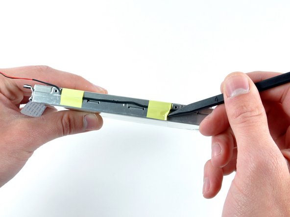 iBook G4 14" 1.42 GHz Reed Switch Board Replacement: step 35, image 1 of 1