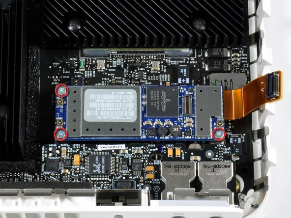 Mac mini Model A1283 AirPort/Bluetooth Combo Card Replacement: step 15, image 1 of 2