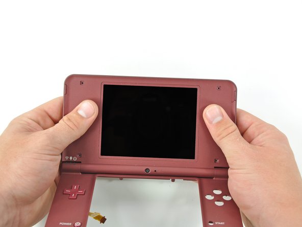 Nintendo DSi XL Camera Ribbon Replacement: step 24, image 1 of 2