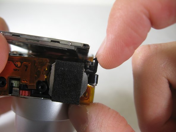 Disassembling Pentax Optio S4i Lens Assembly: step 15, image 2 of 2