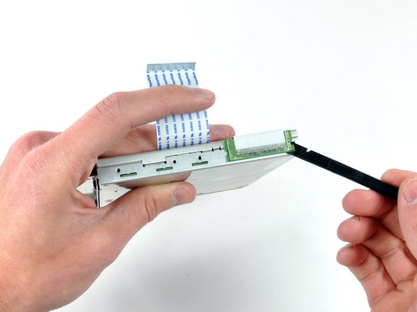 iBook G4 14" 1.42 GHz Optical Drive Replacement: step 38, image 1 of 1
