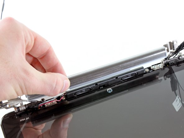 HP Mini 1000 Left Display Hinge Replacement: step 37, image 1 of 1