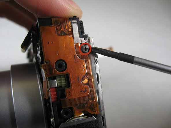 Disassembling Pentax Optio S4i Lens Assembly: step 13, image 1 of 1