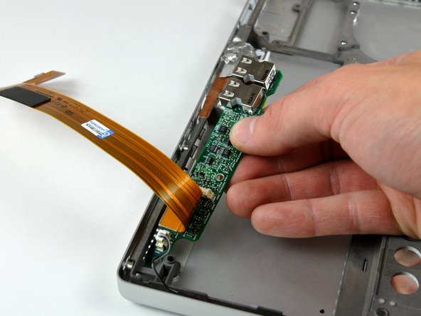 PowerBook G4 Aluminum 17" 1.67 GHz (High-Res) Lower Case Replacement: step 65, image 2 of 2