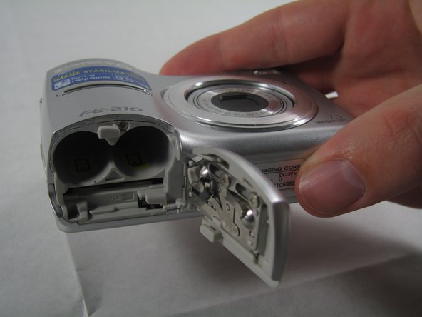 Removing Olympus FE-210 Batteries: step 2, image 2 of 2