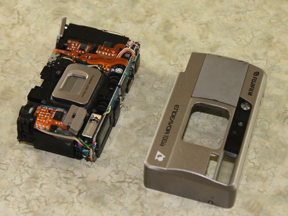 Disassembling Fujifilm Endeavor 100ix Outer Casing: step 11, image 2 of 2