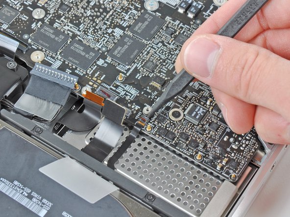 MacBook Pro 17" Unibody Upper Case Replacement: step 20, image 1 of 2