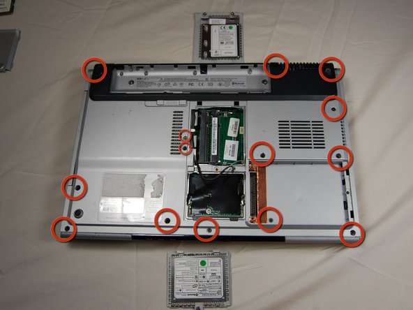 HP Pavilion dv1000 Back Cover Replacement: step 17, image 1 of 2